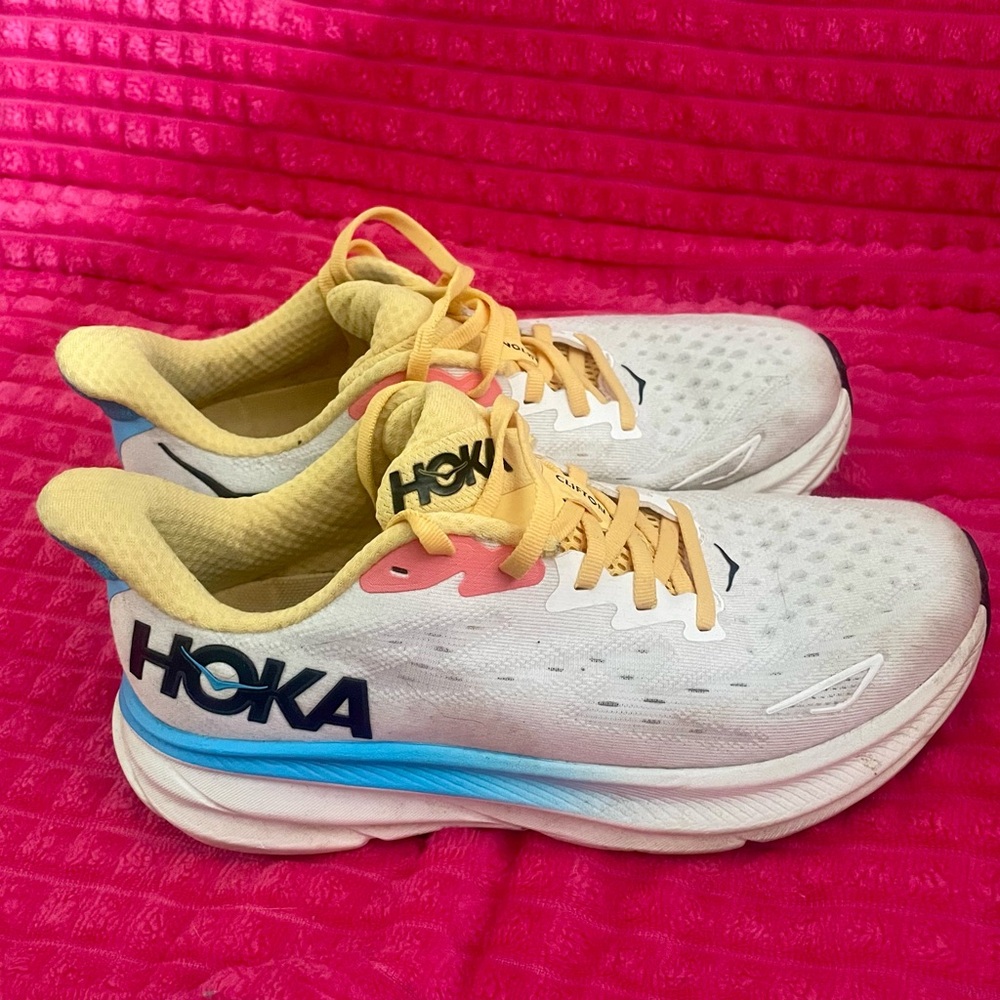 Hoka Clifton 9 Running Shoes in White with Yellow and Blue Accents - Picture 2 of 3